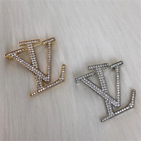 vintage Louis Vuitton brooches